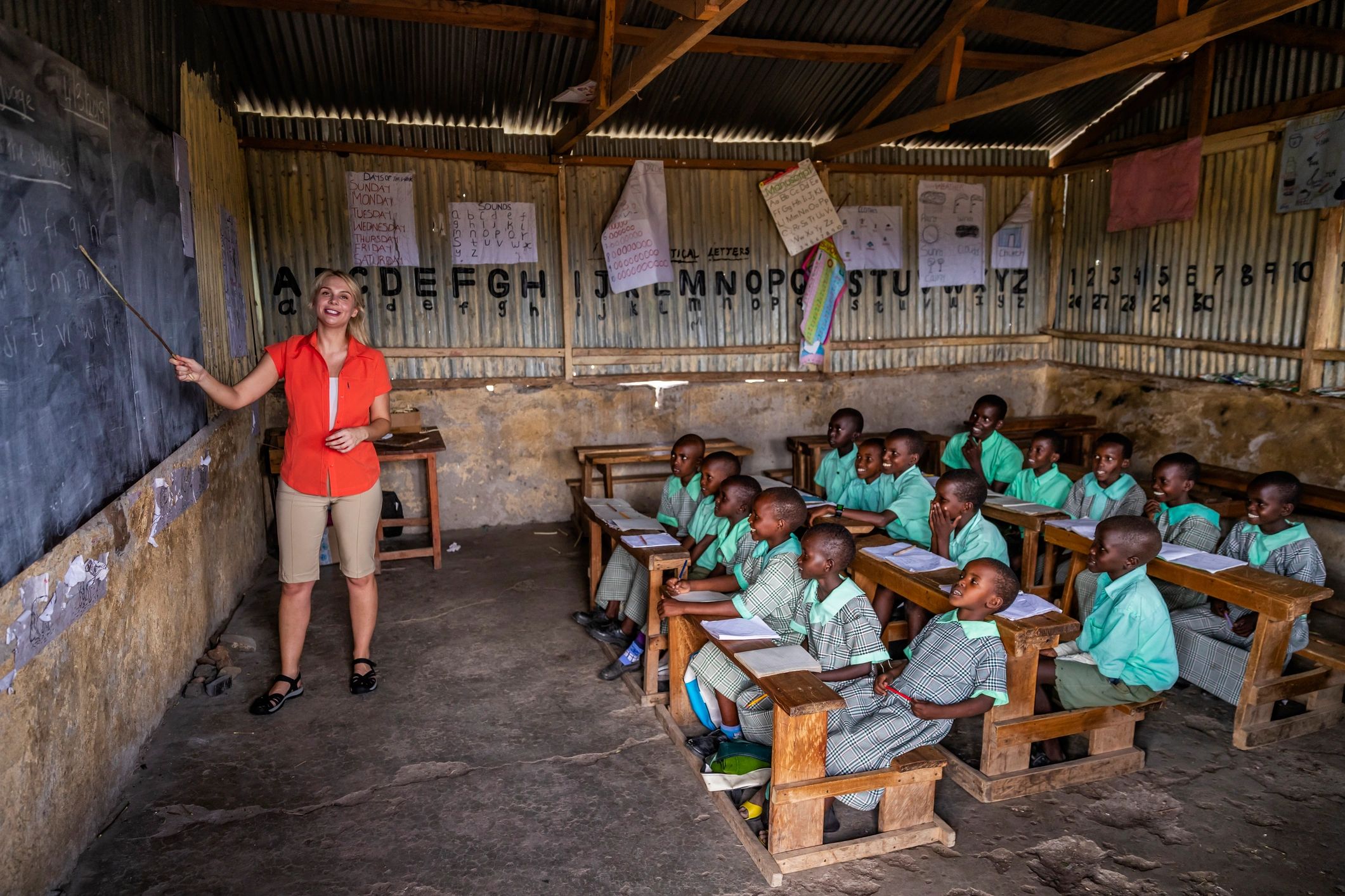 Teacher with students in a classroom